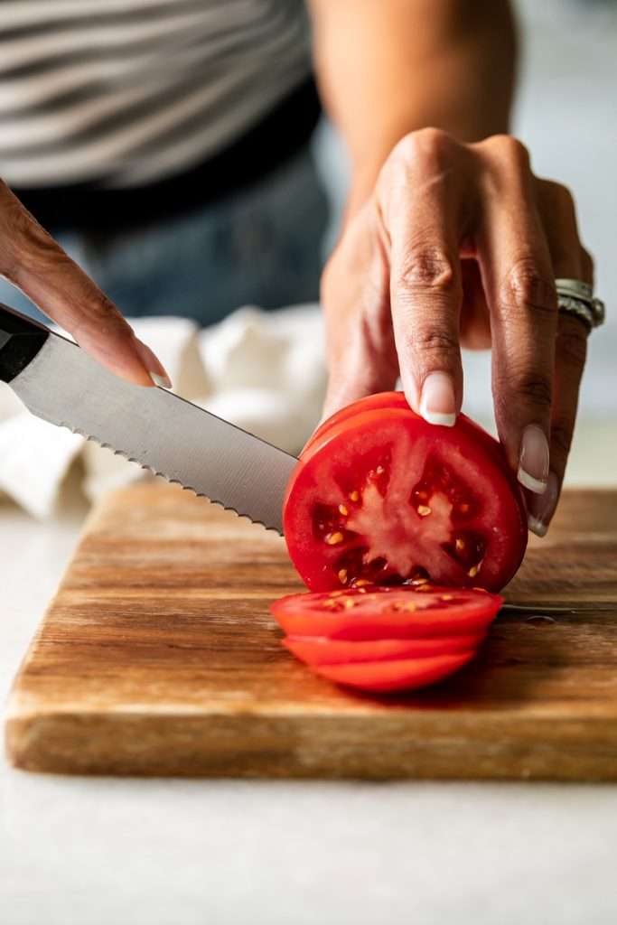 Mini tomato galettes, the perfect party appetizer or brunch treat! Flaky pastry, creamy goat cheese and fresh garden tomatoes, and baked until golden brown.