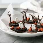 These 3D chocolate sugar cookies are decorated with rich chocolate royal icing and festive Halloween details. Featuring spooky icing transfers, they are not only delicious but perfect for dessert tables. cookie decorating inspiration and halloween themed parties.