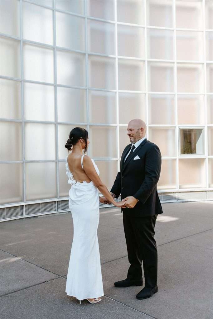Couple celebrating their 20 year wedding anniversary at a black and white themed party